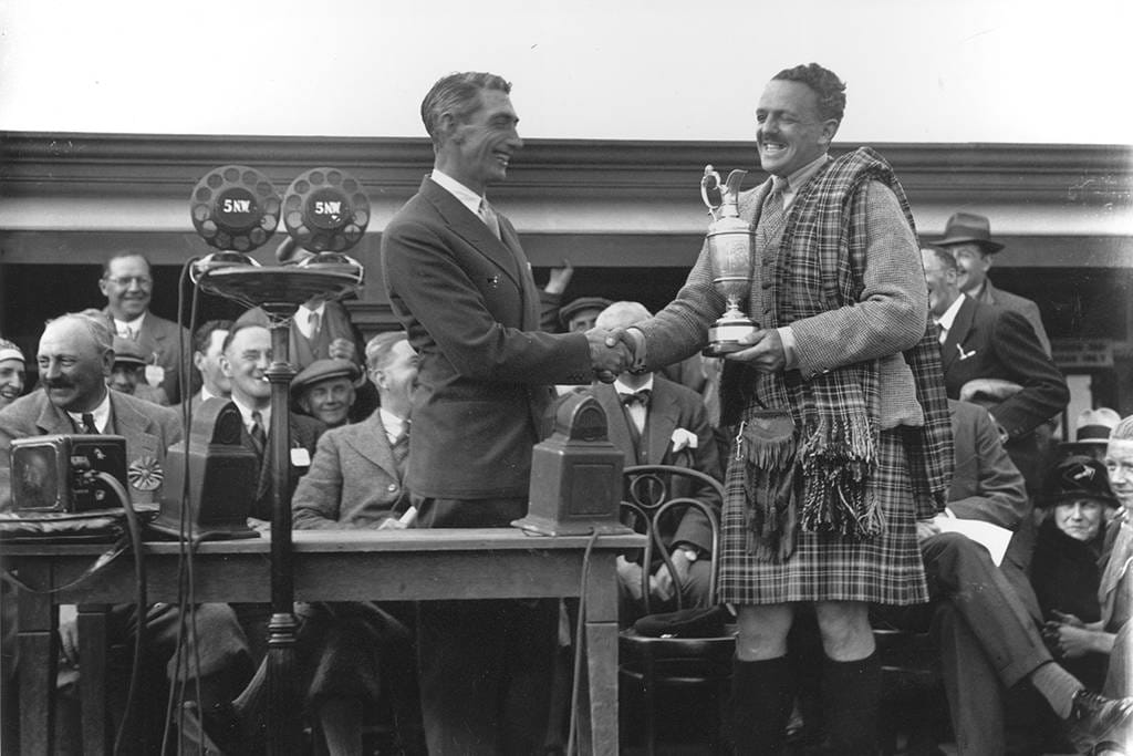 Tommy Armpur receives the Claret Jug in 1931